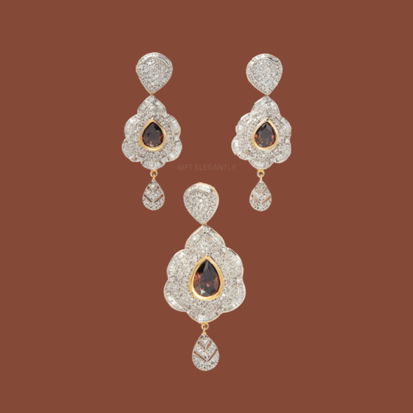 Gift Elegantly's Luminous Harmony Pendant Set features a pear-shaped colored stone, surrounded by diamonds. Perfect for special occasions!