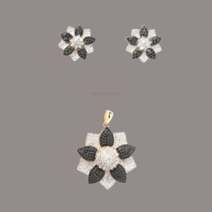 Gift Elegantly's Mystic Night Pendant Set features white and black stones in a floral design, offering a striking contrast perfect for special occasions.