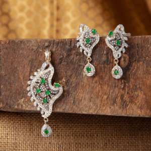 Verdant Eclipse Pendant Set by Gift Elegantly features vibrant green stones in a stunning design for special occasion elegance. Perfect for celebrations!