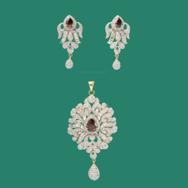 Majestic Jewel Pendant Set by Gift Elegantly features a pear-shaped colored stone with diamond-studded latkan. Ideal for special occasions!