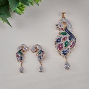 The Majestic Peacock Pendant Set by Gift Elegantly showcases round diamonds and colorful enameling in a peacock shape, perfect for special occasions.