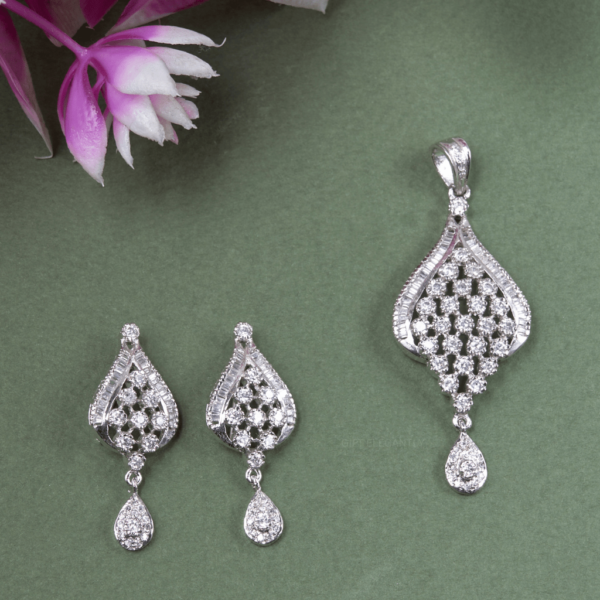 Ethereal Allure Pendant Set by Gift Elegantly features round and baguette imitation diamonds in a net-like design with a diamond-studded latkan. Perfect for special occasions