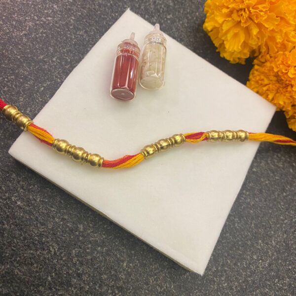 Golden beads moli rakhi