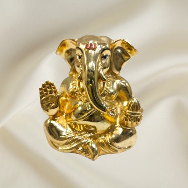 "Divine Gold Ganesha Murti - 3-inch marble dust idol with gold coating"