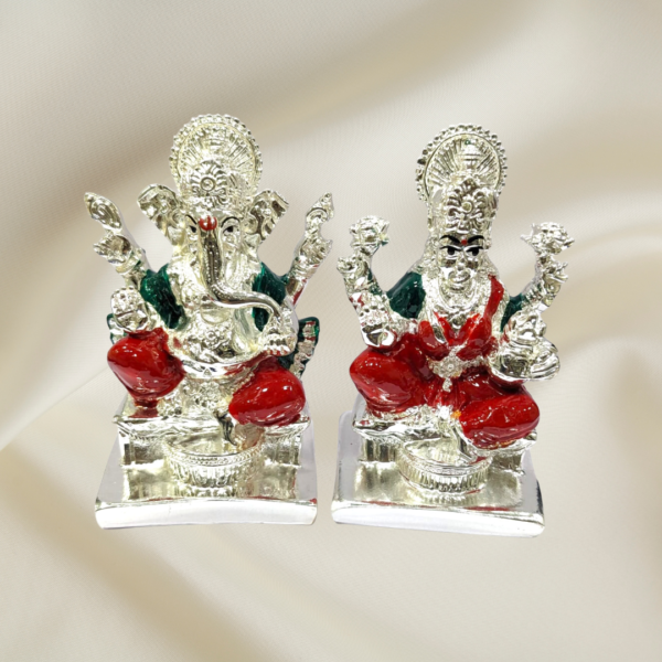 "Divine Harmony Ganesha Lakshmi Murti - 4-inch marble dust set with silver coating and colorful enamel accents"