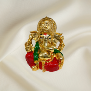 "Divine Joy Ganesha Murti - 3-inch marble dust idol with gold coating and colorful accents"