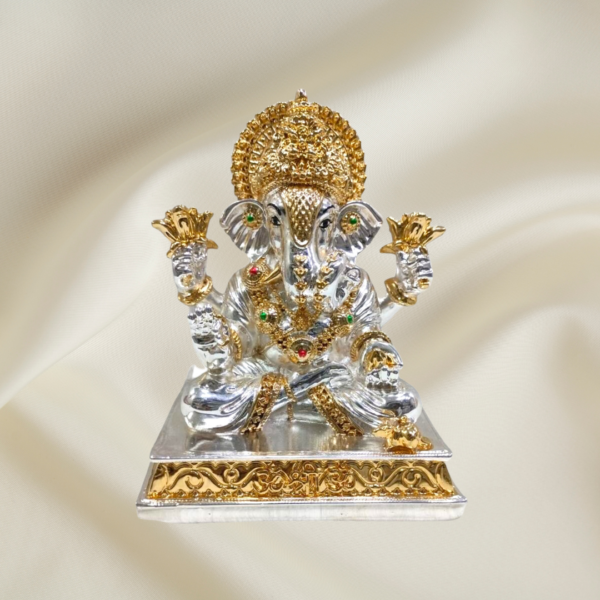 "Divine Splendor Ganesha Murti - 6-inch marble dust idol with silver and gold coatings and colorful enamel accents"