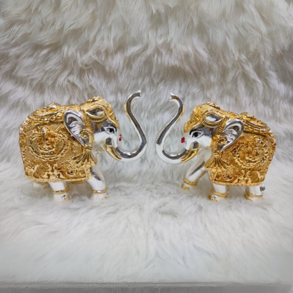 "Silver and Gold Divine Royal Elephant Figurines - 2-inch marble dust set with gold coating"