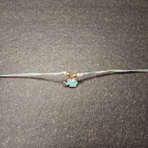 Turquoise elephant enamel charm rakhi on pastel pink and aqua resham thread with bead accents