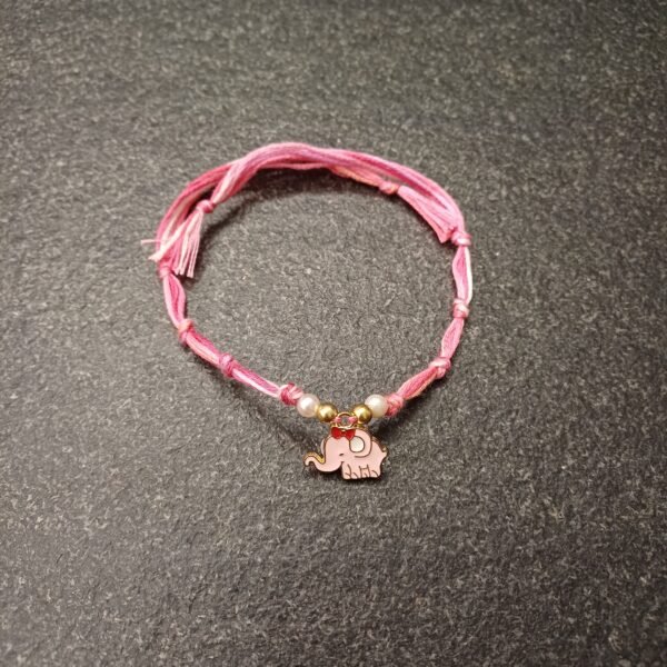 Peppy Pink Elephant rakhi with pink and peach resham thread and elephant enamel charm