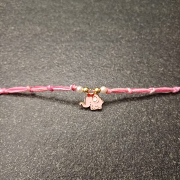 Peppy Pink Elephant rakhi with pink and peach resham thread and elephant enamel charm