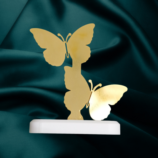 Butterfly Transformation Brass Idol with a Corian base, ideal for home and office decor, and perfect for bulk and corporate gifting.