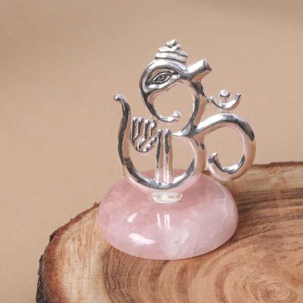 Om Ganesh 925 sterling silver article on a rose quartz base, perfect for decor and gifting.