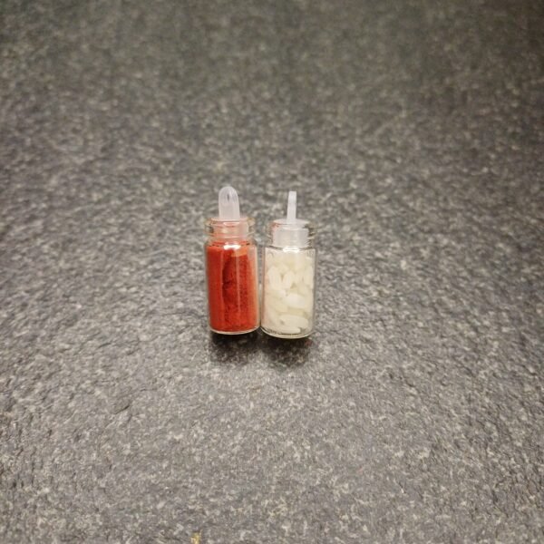 Roli chawal in transparent vials for tilak and Hindu pooja rituals