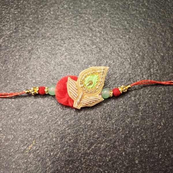 Peacock Charm Resham Rakhi with green beads and intricate embroidery