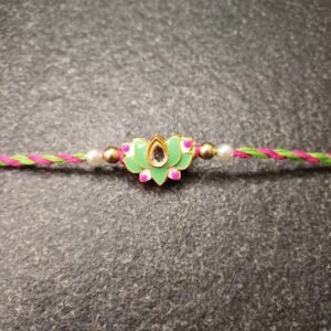 Handmade Green Lotus Kundan Rakhi with pink and green thread and kundan stone