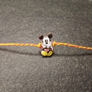 Disney Mickey Mouse cartoon rakhi on red-yellow resham thread