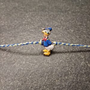 Donald Duck enamel rakhi on multicolour resham thread for kids