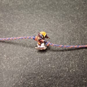 Wolverine claw cartoon rakhi with multicolour thread for kids