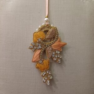 Twilight Bloom Bhabhi Rakhi with embroidered golden floral design and pearl detailing