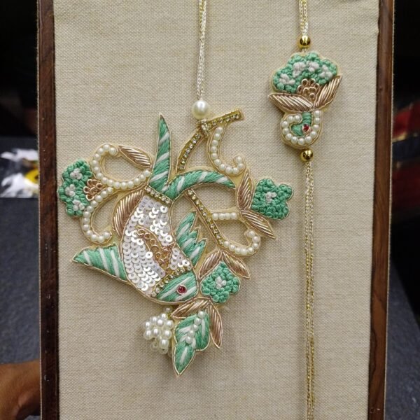 Pearl Fish Embroidery Rakhi Pair with bhabhi lumba and coordinated thread design
