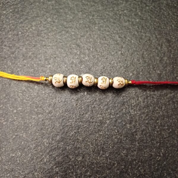 Hare Ram Moli Rakhi with white sacred beads on red-yellow thread