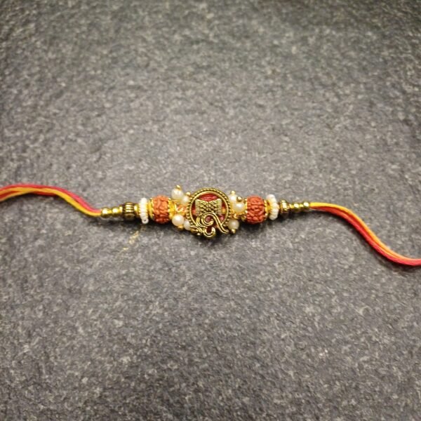 Om Rudraksh Moli Rakhi with pearls and red-yellow thread