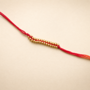 Golden Bead Red Moli Rakhi