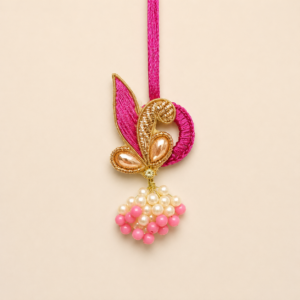 Graceful Pink Paisley Pearl Lumba Rakhi