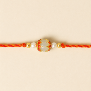 Chandrika Pearl Globe Moli Rakhi